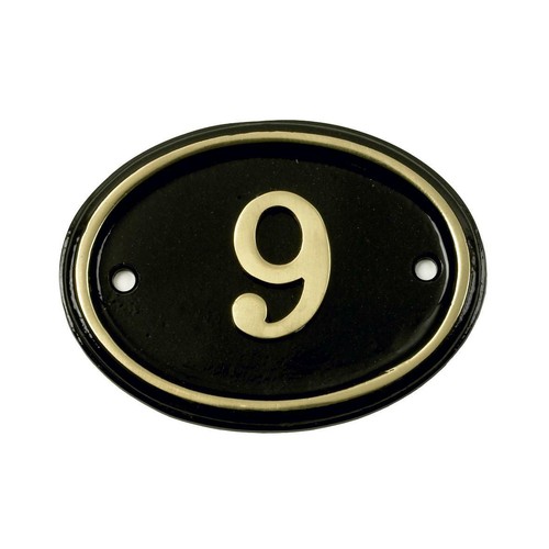 Polished brass black oval - brass,